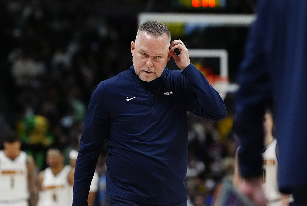 Denver Nuggets head coach Michael Malone following a timeout in the fourth quarter against the Washington Wizards at Ball Arena