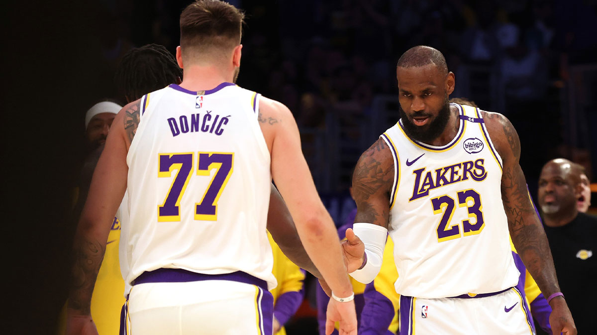 Los Angeles Lebron James (23) and Guard Luka Doncic (77) react after the play during the first quarter at La Clippers on Cripto.com Arena. Mandatory Credit: Jason ParkHurst-Immsn Pictures