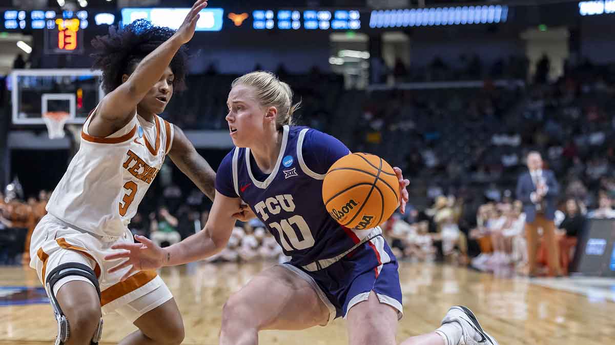 TCU Horned Frogs guard Hailey Van Lith (10) works against Texas Longhorns guard Rori Harmon (3) during the second half of an Elite 8 NCAA Tournament basketball game at Legacy Arena.