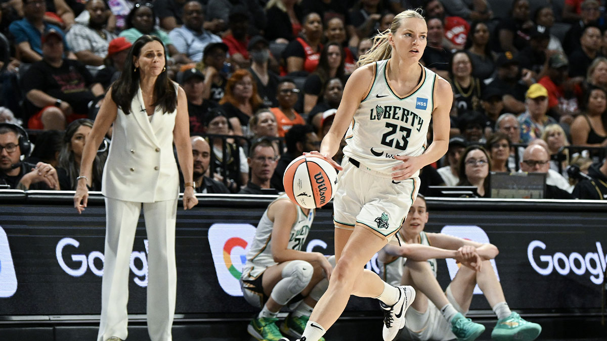 New York Liberty guard Marine Johannes (23) dribbles up the court against the Las Vegas Aces at Michelob Ultra Arena.