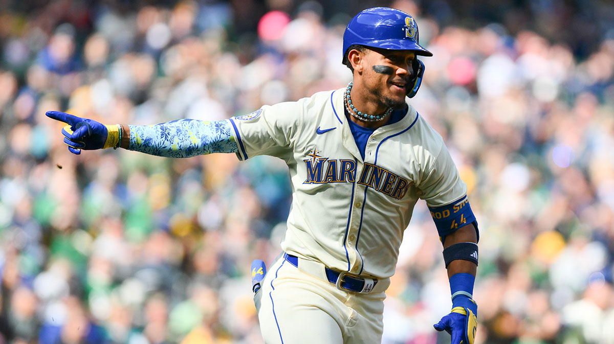 Seattle Mariners center fielder Julio Rodriguez (44) celebrates after hitting an RBI single against the Oakland Athletics during the fifth inning at T-Mobile Park.