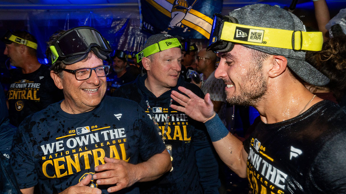 (Right) Milwaukee Brewers right fielder Sal Frelick (10) celebrates with (left) Milwaukee Brewers owner Mark Attanasio after the victory over the Philadelphia Phillies and winning the NL Central Division championship on Wednesday September 18, 2024 at American Family Field in Milwaukee, Wis.