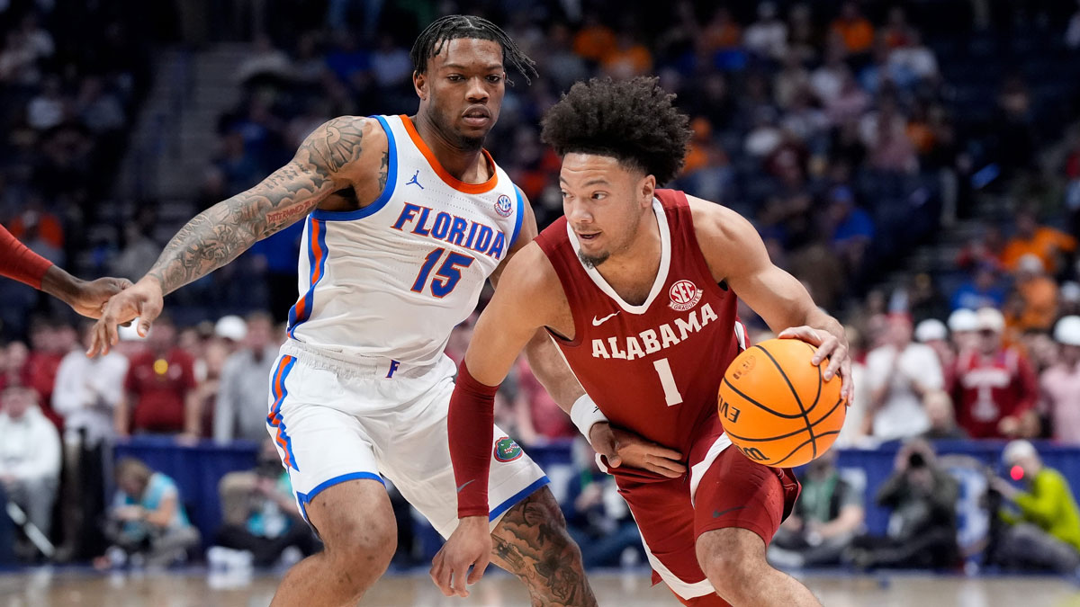 Alabama guard Mark Sears (1) works past Florida guard Alijah Martin (15) during the first half of a Southeastern Conference tournament semifinal game at Bridgestone Arena in Nashville, Tenn., Saturday, March 15, 2025.