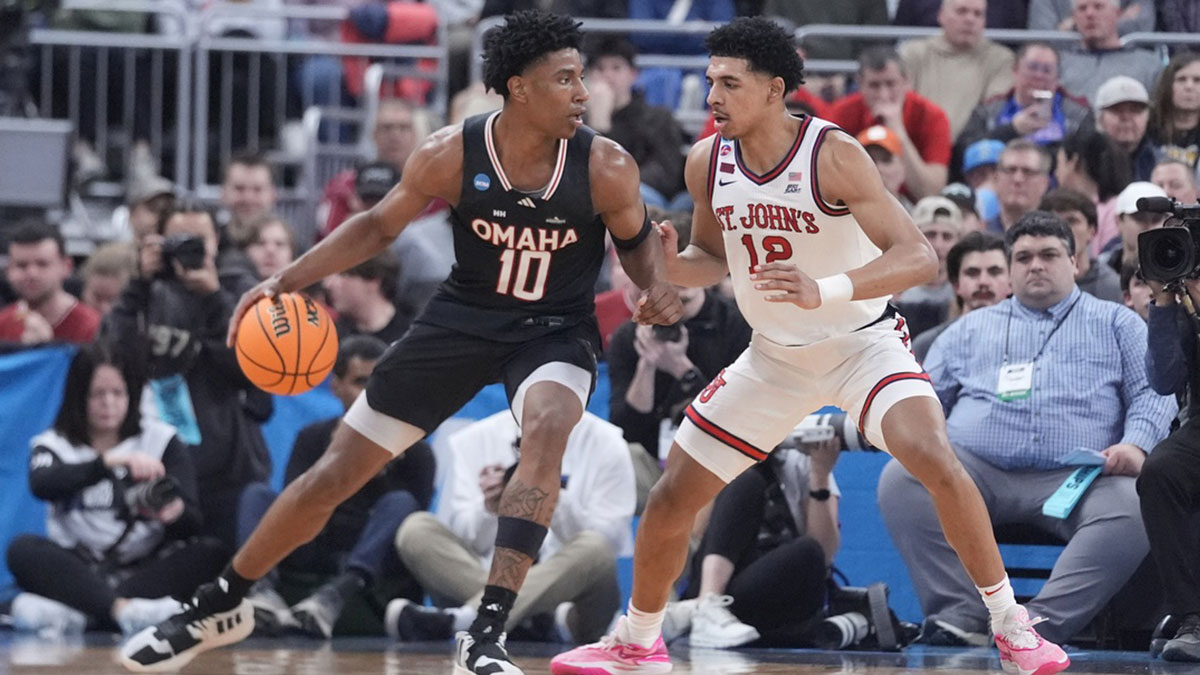 Omaha Mavericks forward Marquel Sutton (10) controls the ball against St. John's Red Storm guard RJ Luis Jr. (12) during the first half at Amica Mutual Pavilion. Mandatory Credit: Gregory Fisher-Imagn Images