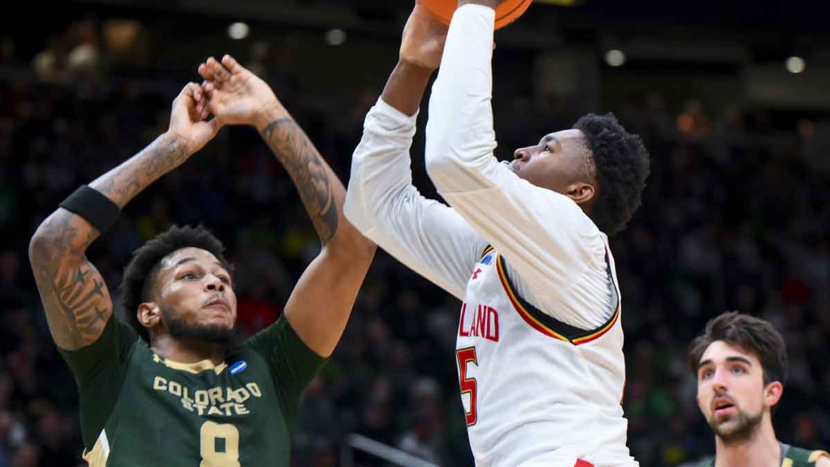 Maryland Terrapins center Derik Queen (25) drives to the basket against Colorado State Rams forward Jaylen Crocker-Johnson (8) in the first half at Climate Pledge Arena.