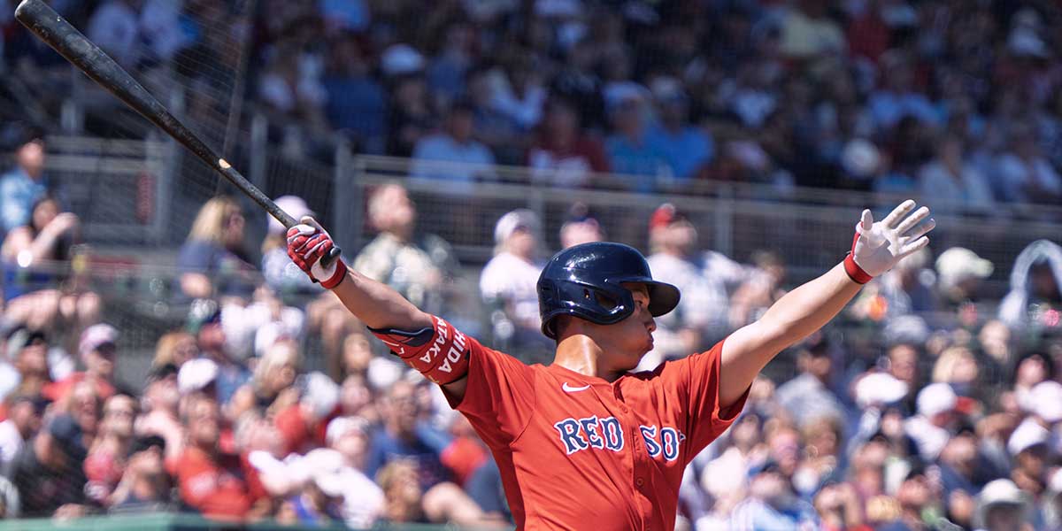 Boston Red Sox Masataka Yoshida (7) flies out to left field during their spring training game with the Phillies at JetBlue Park at Fenway South. 