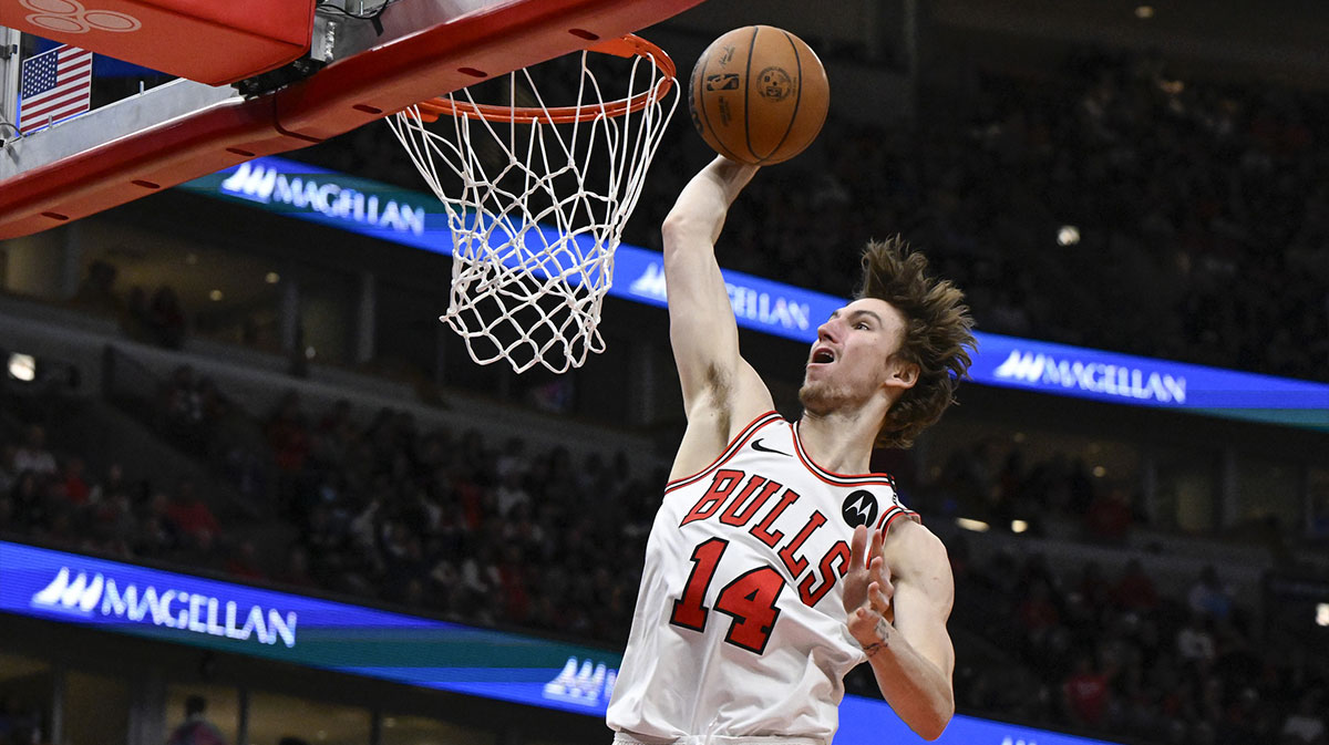 Mar 10, 2025; Chicago, Illinois, USA; Chicago Bulls forward Matas Buzelis (14) dunks the ball against the Indiana Pacers during the second half at United Center.