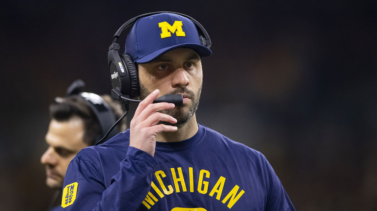 Michigan Wolverines quarterbacks coach Matt Weiss against the Iowa Hawkeyes in the Big Ten Conference championship game at Lucas Oil Stadium.