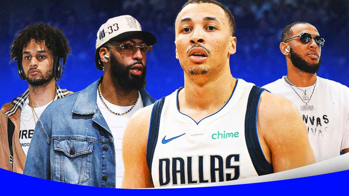 Mavericks Dante Exum in front looking serious. Need Anthony Davis, Dereck Lively II and Daniel Gafford all in normal clothes (not basketball uniforms) in background.