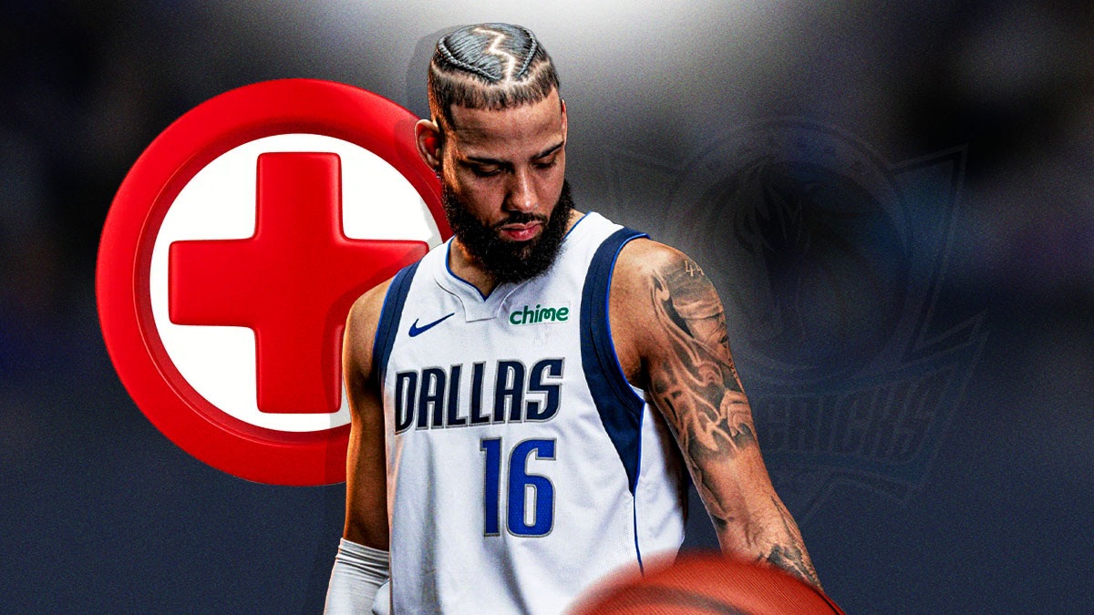 Mavericks' Caleb Martin with medical Red Cross symbol