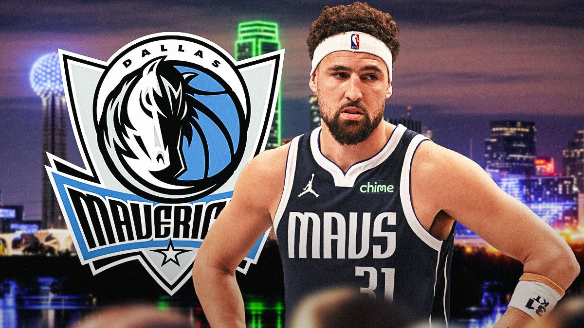 Mavericks Klay Thompson in front looking serious, close up image. Place the Dallas skyline in the background at night, with the Dallas Mavericks logo somewhere in image.