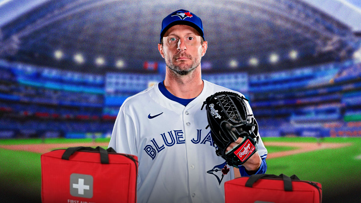Blue Jays' Max Scherzer, medical kit next to him, Rogers Centre behind him