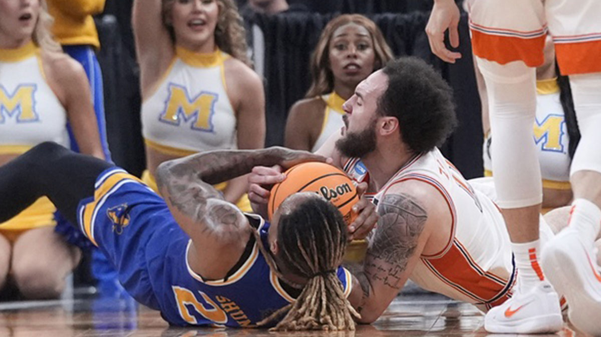 Mar 20, 2025; McNeese State Cowboys forward Christian Shumate (24) battles Clemson Tigers guard Jaeden Zackery (11) for a ball on the floor during the first half at Amica Mutual Pavilion. Mandatory Credit: Gregory Fisher-Imagn Images