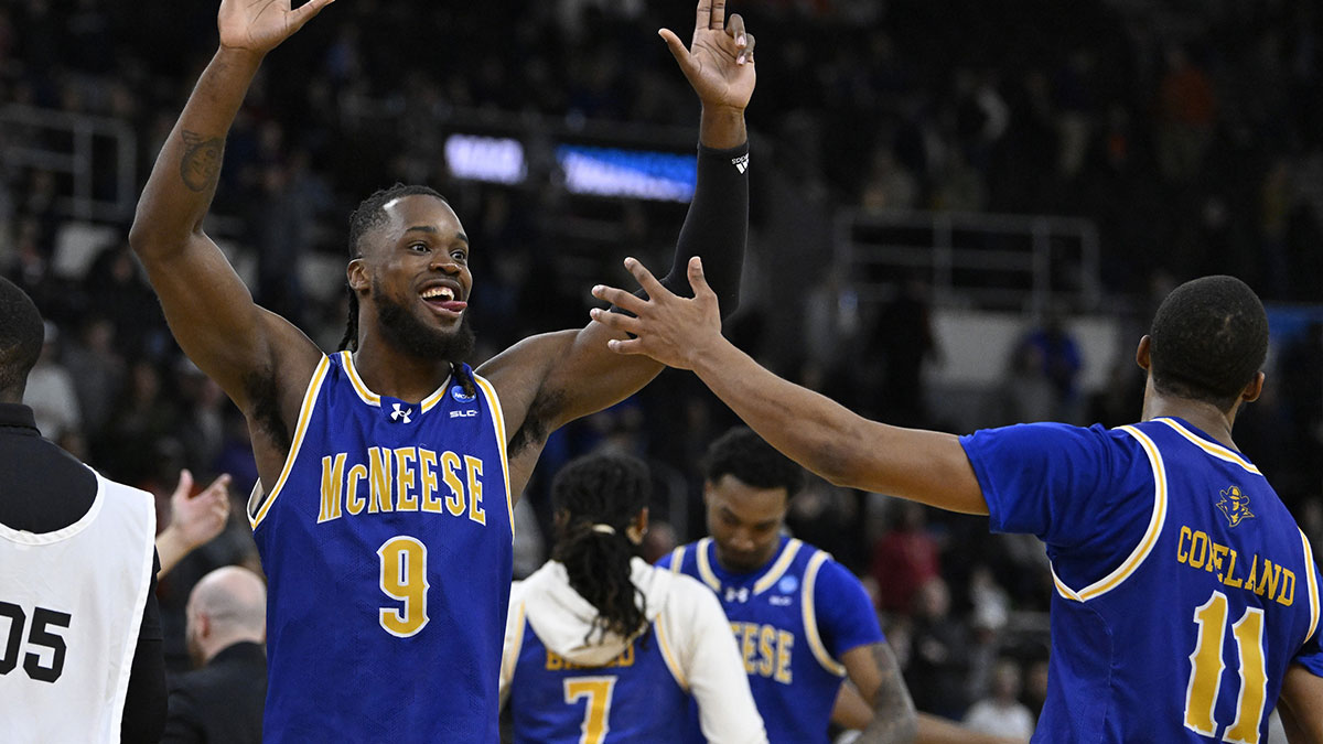 McNeese State Cowboys forward Christian Shumate (24) celebrates with guard Quadir Copeland (11) after defeating the Clemson Tigers at Amica Mutual Pavilion.