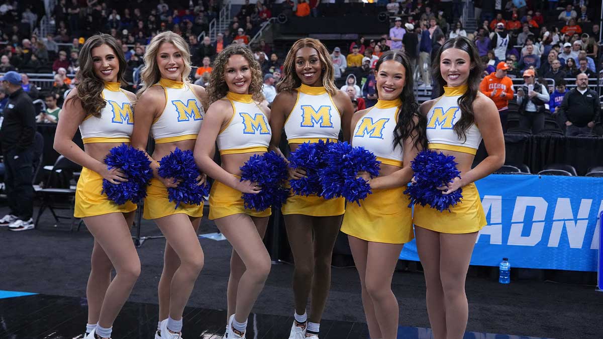 McNeese State Cowboys cheerleaders pose before a game against the Clemson Tigers at Amica Mutual Pavilion.