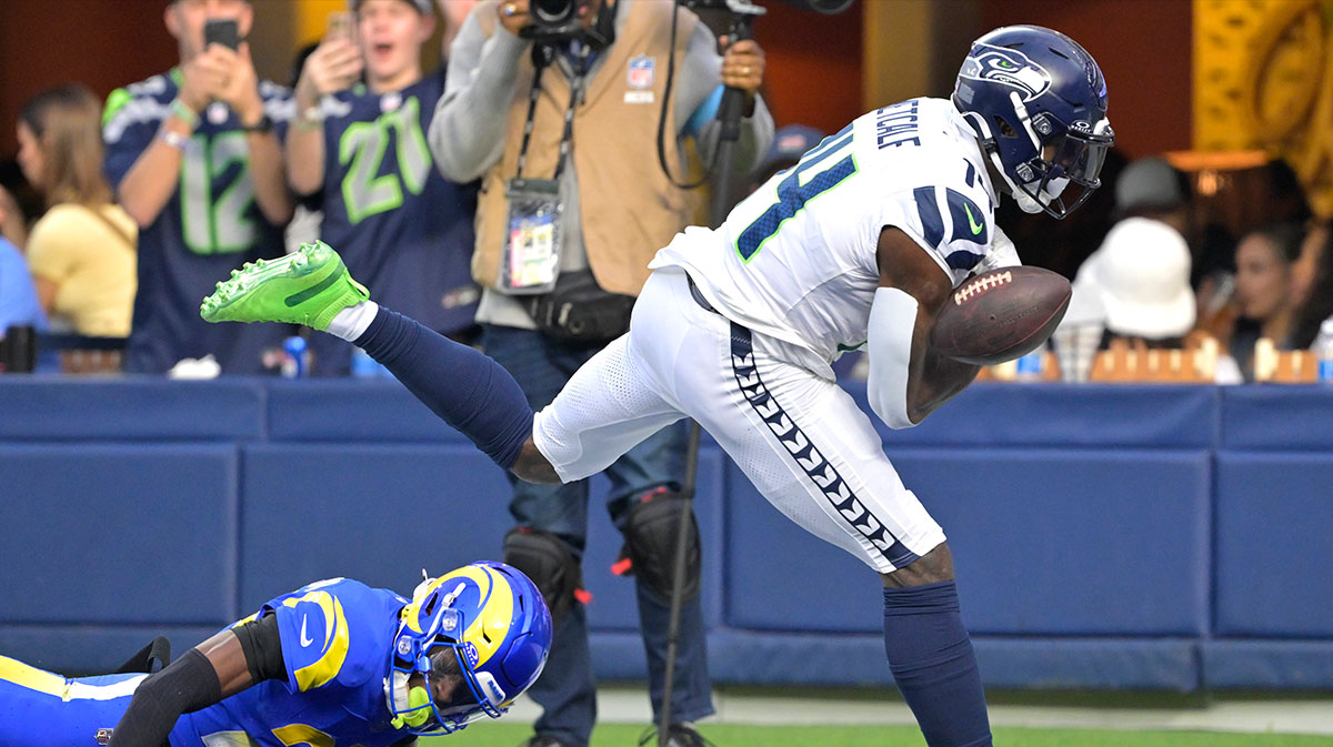 Seattle Seahawks wide receiver DK Metcalf (14) can’t hang on to a pass in the end zone as he is defended by Los Angeles Rams cornerback Emmanuel Forbes Jr. (25) in the first half at SoFi Stadium.