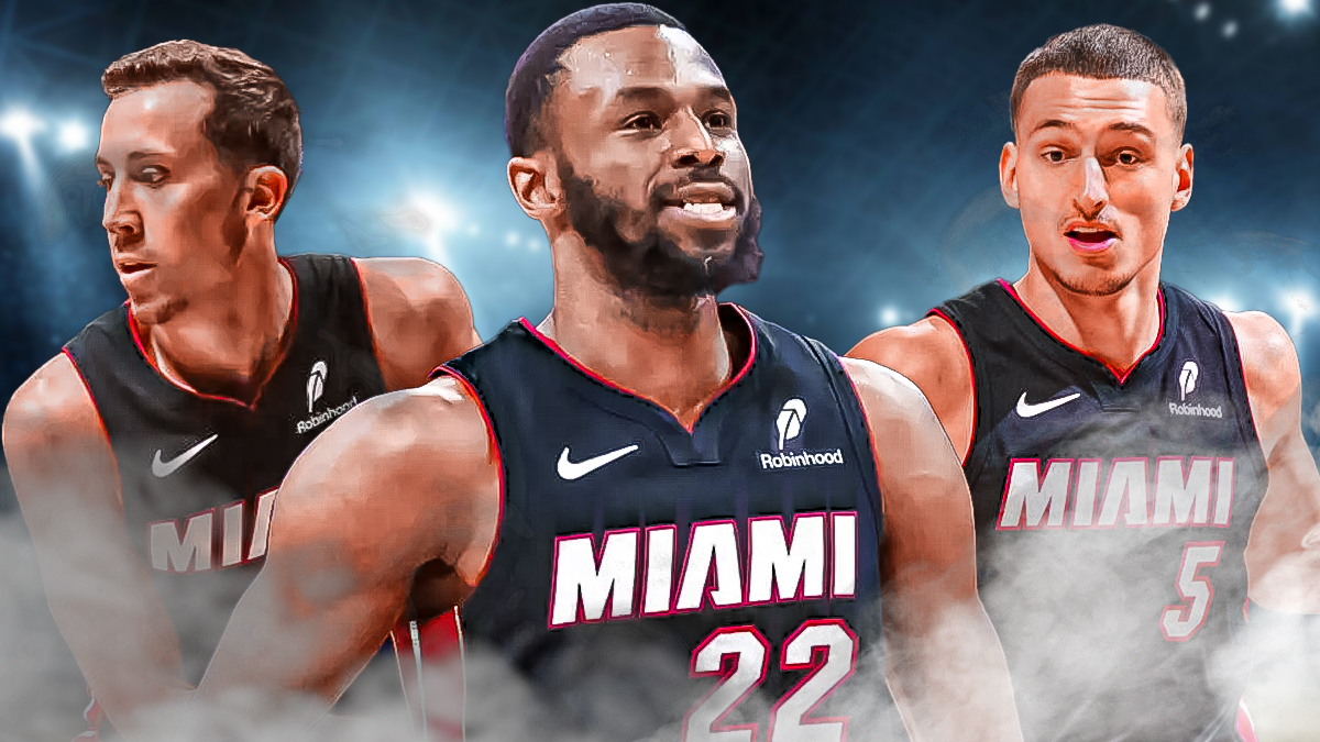 Miami Heat star Andrew Wiggins in the middle with Duncan Robinson and Nikola Jovic on either side in front of Kaseya Center.