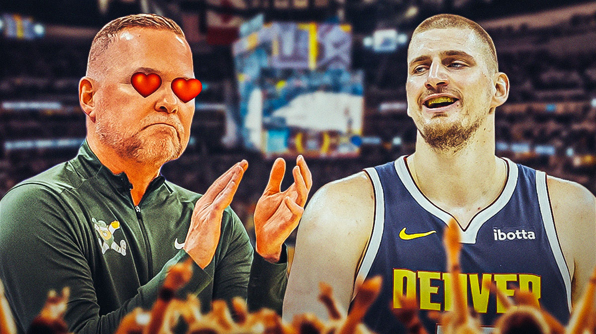 Nuggets' Michael Malone with heart eyes looking at Nikola Jokic.