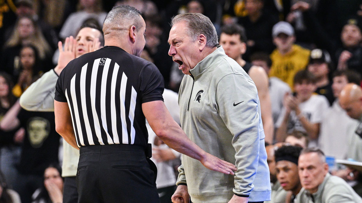 Michigan State Spartans head coach Tom Izzo talks with an official during the second half against the Iowa Hawkeyes at Carver-Hawkeye Arena.