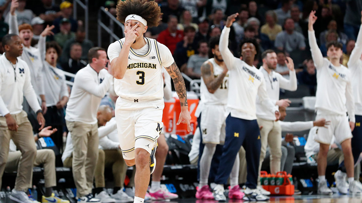 Michigan Wolverines guard Tre Donaldson (3) celebrates after scoring Friday, March 14, 2025, during the Big Ten Men’s Basketball Tournament game against the Purdue Boilermakers at Gainbridge Fieldhouse in Indianapolis. Michigan Wolverines won 86-68.