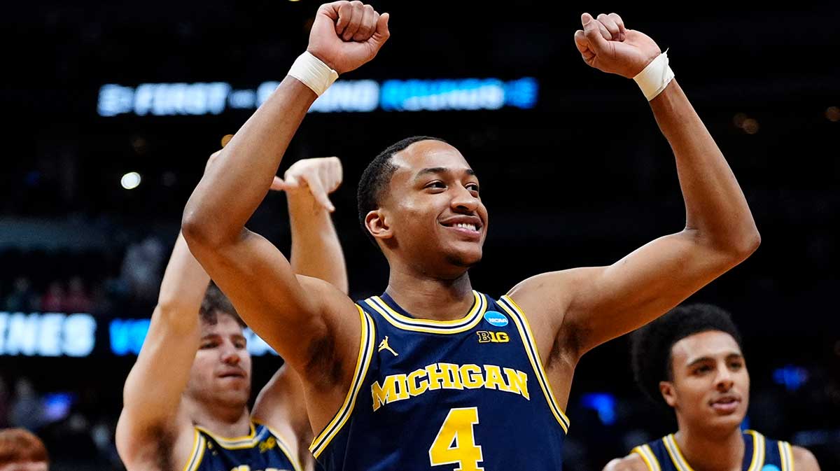 Michigan Wolverines guard Nimari Burnett (4) reacts after defeating the Texas A&M Aggies n the second round of the NCAA Tournament at Ball Arena.