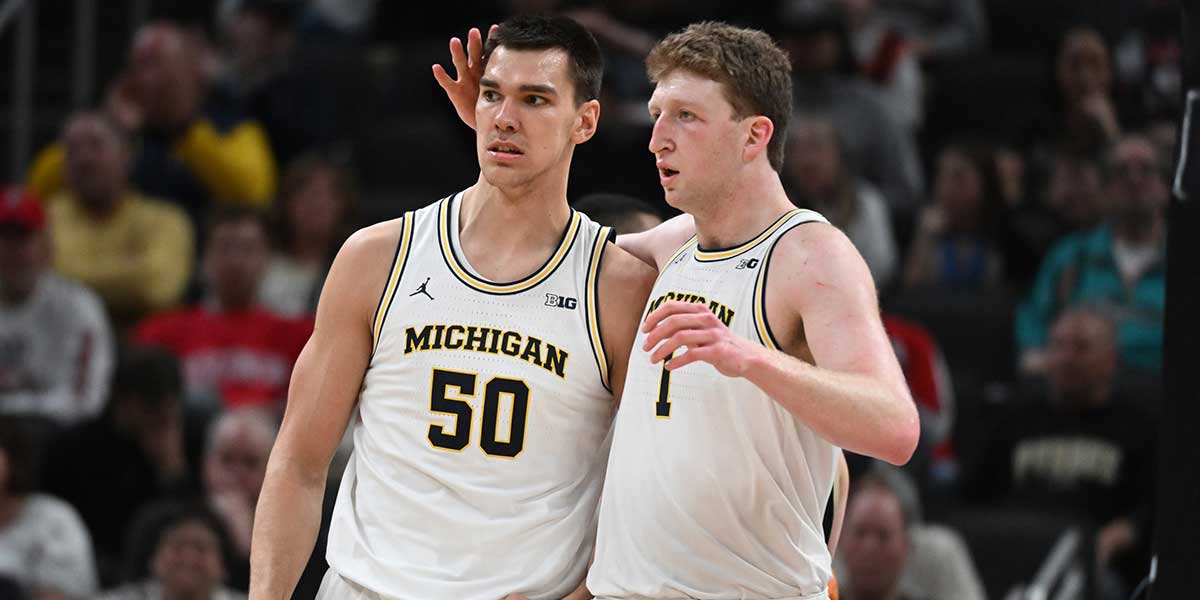 Michigan Wolverines center Vladislav Goldin (50) and center Danny Wolf (1) celebrate after a play during the second half against the Purdue Boilermakers at Gainbridge Fieldhouse. Mandatory Credit: Mar 14, 2025; Indianapolis, IN, USA; Michigan Wolverines center Vladislav Goldin (50) and center Danny Wolf (1) celebrate after a play during the second half against the Purdue Boilermakers at Gainbridge Fieldhouse.