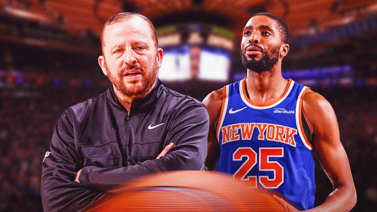 Knicks' Mikal Bridges with hands together looking at Tom Thibodeau
