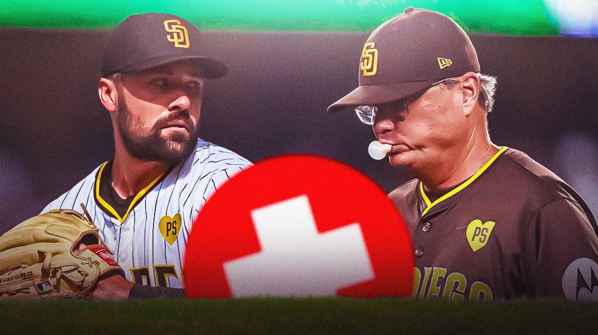 Padres Pitcher Matt Waldron standing next to manager Mike Shildt with the medical red cross