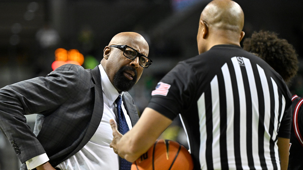 Indiana Hoosiers head coach Mike Woodson questions the referee regarding a call during the first half against the Oregon Ducks at Matthew Knight Arena.
