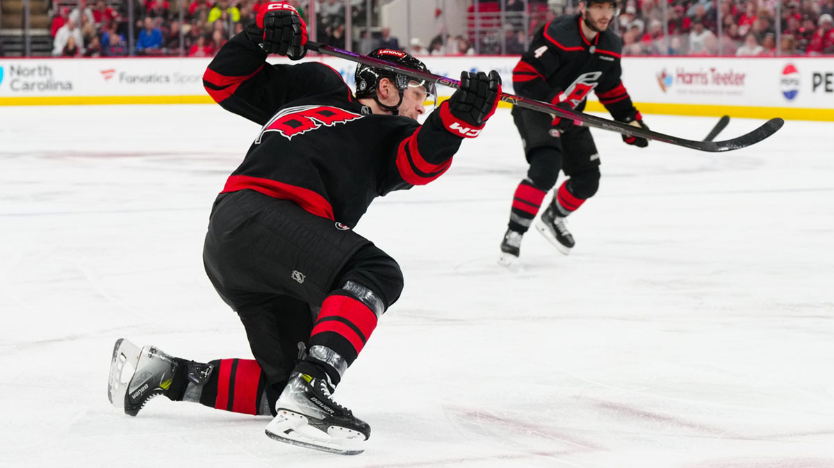 Carolina Hurricanes right wing Mikko Rantanen (96) takes a shot against the Edmonton Oilers during the third period at Lenovo Center.