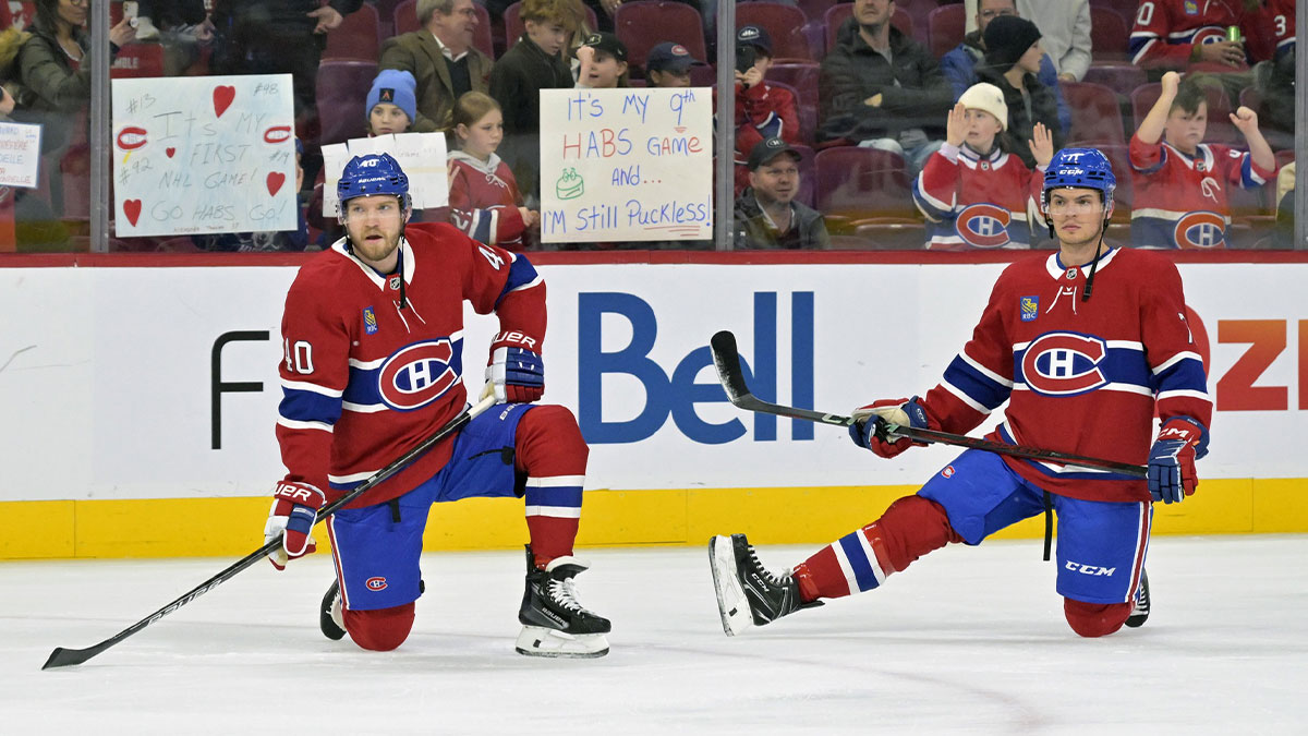 Montreal Canadiens forward Joel Armia (40) and teammate forward Jake Evans (71) stretch during the warmup period before the game against the San Jose Sharks at the Bell Centre