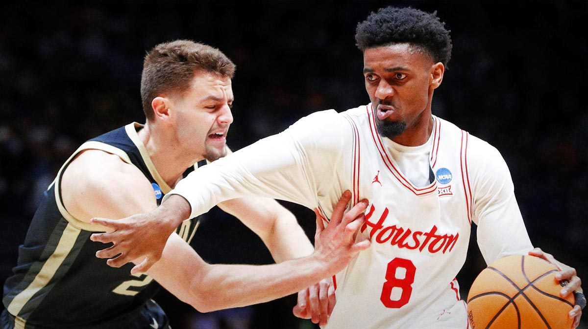 Purdue Boilermakers forward Camden Heide (23) defends Houston Cougars guard Mylik Wilson (8) Friday, March 28, 2025, during the NCAA Tournament Sweet 16 game at Lucas Oil Stadium in Indianapolis.