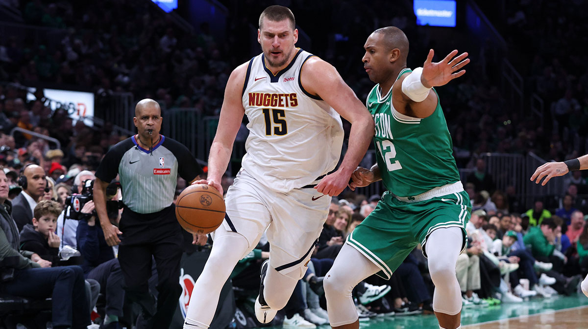 Denver Nuggets Center Nikola Jokić (15) Dribible Court Brani Boston Celtics Center Al Horford (42) During the first half in the TD garden.