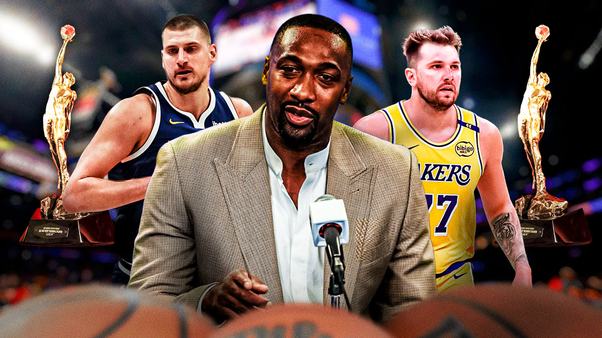 NBA analyst Gilbert Arenas in between Nuggets All-Star Nikola Jokic and Lakers guard Luka Doncic with the NBA MVP trophy in the background