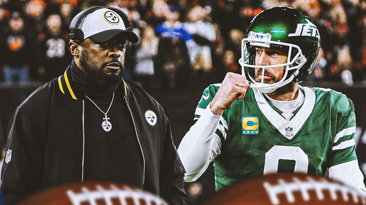 Pittsburgh Steelers head coach Mike Tomlin next to Aaron Rodgers in front of Acrisure Stadium.