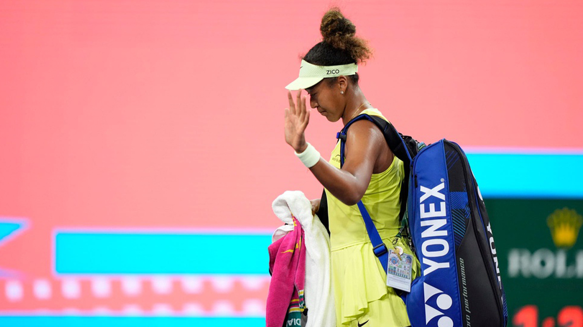 Naomi Osaka waves to the crowd after her first-round loss to Camila Osorio at the BNP Paribas Open in Indian Wells, Calif., on Wednesday, March 5, 2025.