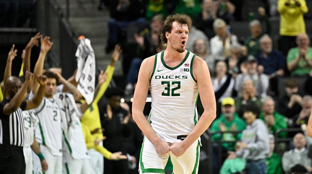Oregon Ducks center Nate Bittle (32) reacts to a made three point shot against the Rutgers Scarlet Knights during the second half at Matthew Knight Arena.