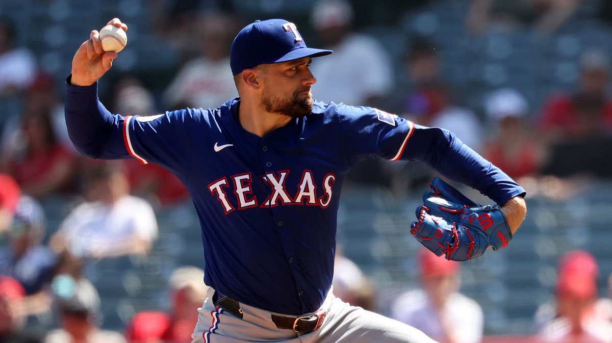 Texas Rangers starting pitcher Nathan Eovaldi (17) pitches during the third inning against the Los Angeles Angels at Angel Stadium. 