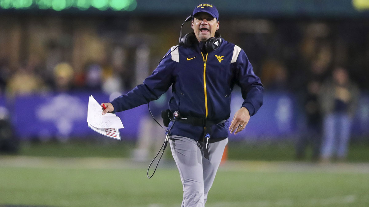 Nov 23, 2024; Morgantown, West Virginia, USA; West Virginia Mountaineers head coach Neal Brown argues a call during the fourth quarter against the UCF Knights at Mountaineer Field at Milan Puskar Stadium.