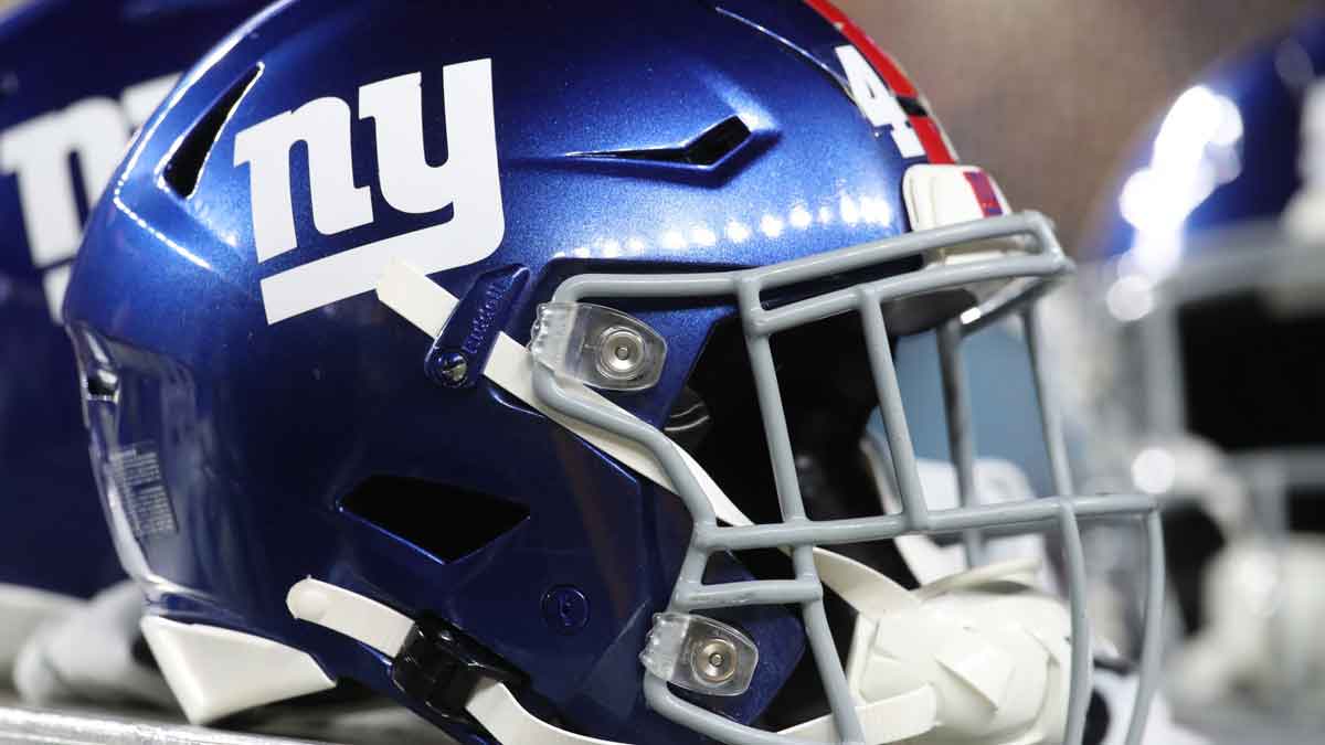 New York Giants helmets on the sidelines against the Pittsburgh Steelers during the third quarter at Acrisure Stadium