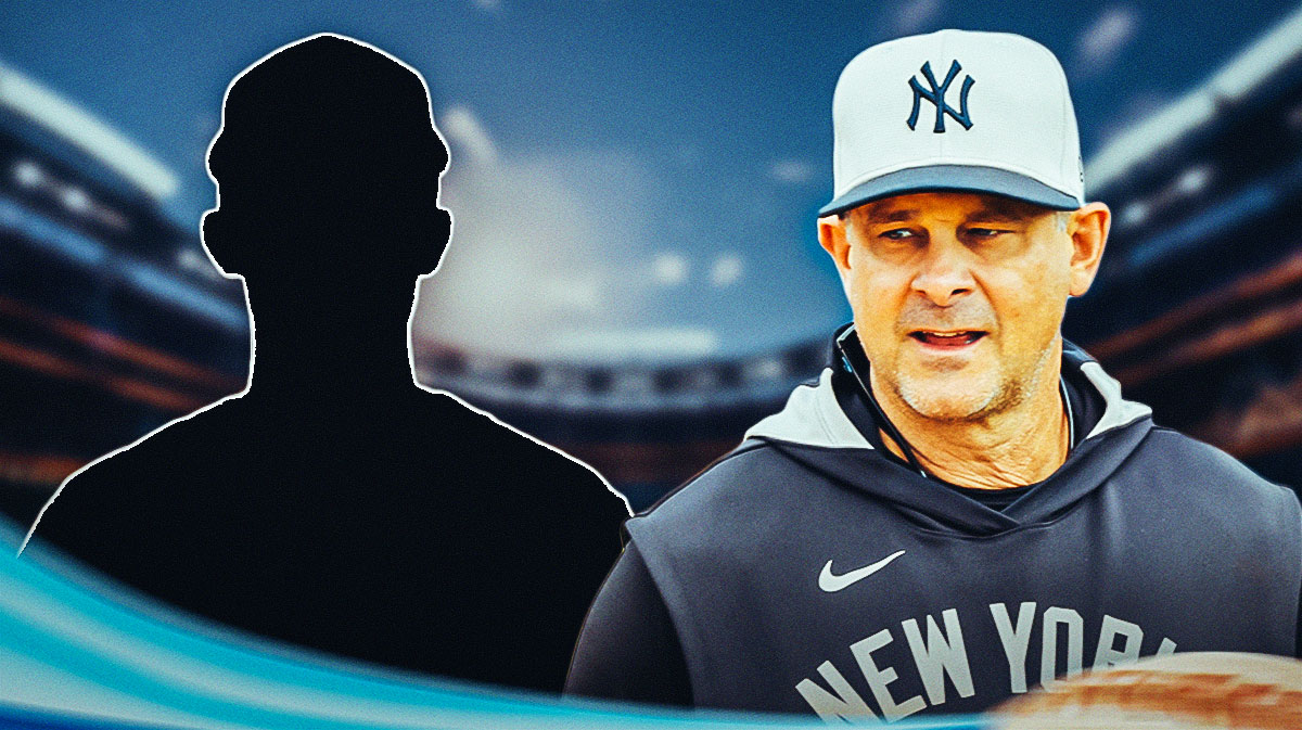 Aaron Boone next to SILHOUETTE of Ryan Yarbrough