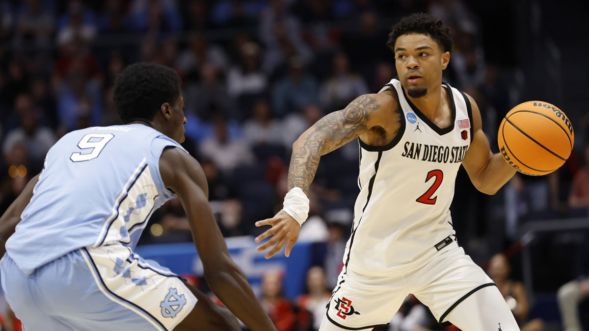 San Diego State Aztecs guard Nick Boyd (2) plays the ball defended by North Carolina Tar Heels guard Drake Powell (9) in the first half at UD Arena in NCAA Tournament transfer portal.