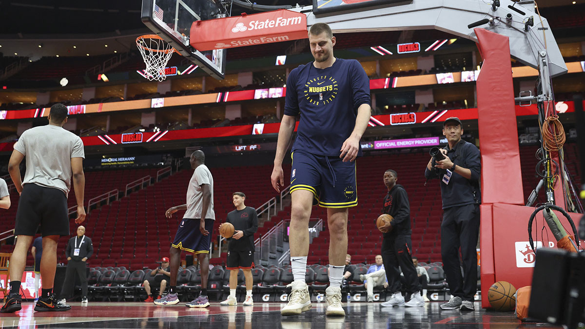 Denver Nuggets center Nikola Jokic (15) walks off the court after practicing before the game against the Houston Rockets at Toyota Center.
