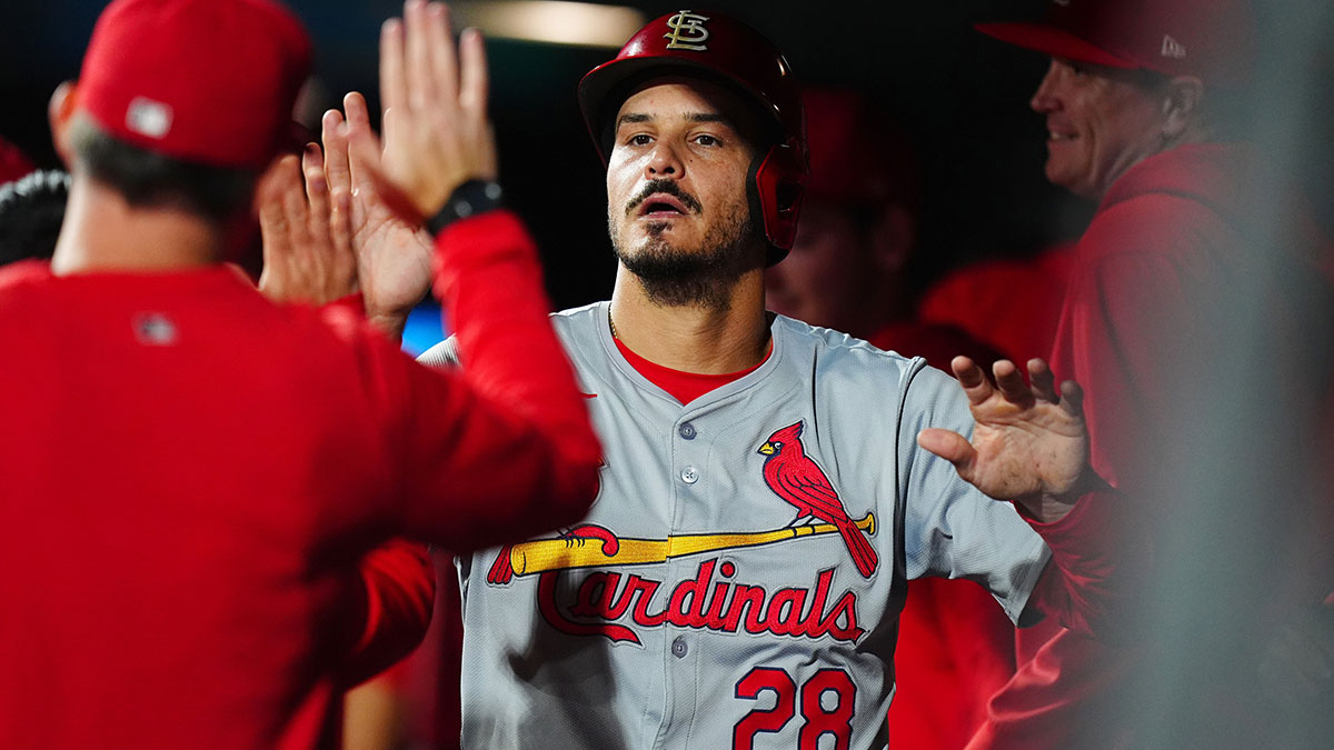 Sep 24, 2024; Denver, Colorado, USA; St. Louis Cardinals third base Nolan Arenado (28) celebrates with teammates after scoring in the eighth inning against the Colorado Rockies at Coors Field.