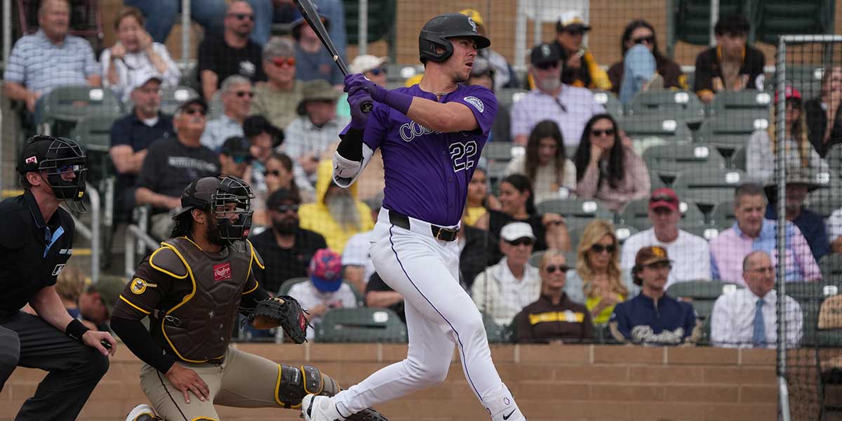Colorado Rockies outfielder Nolan Jones (22) hits against the San Diego Padres in the second inning at Salt River Fields at Talking Stick.