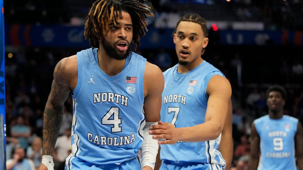 North Carolina Tar Heels guard RJ Davis (4) and guard Seth Trimble (7) react in the second half at Spectrum Center.