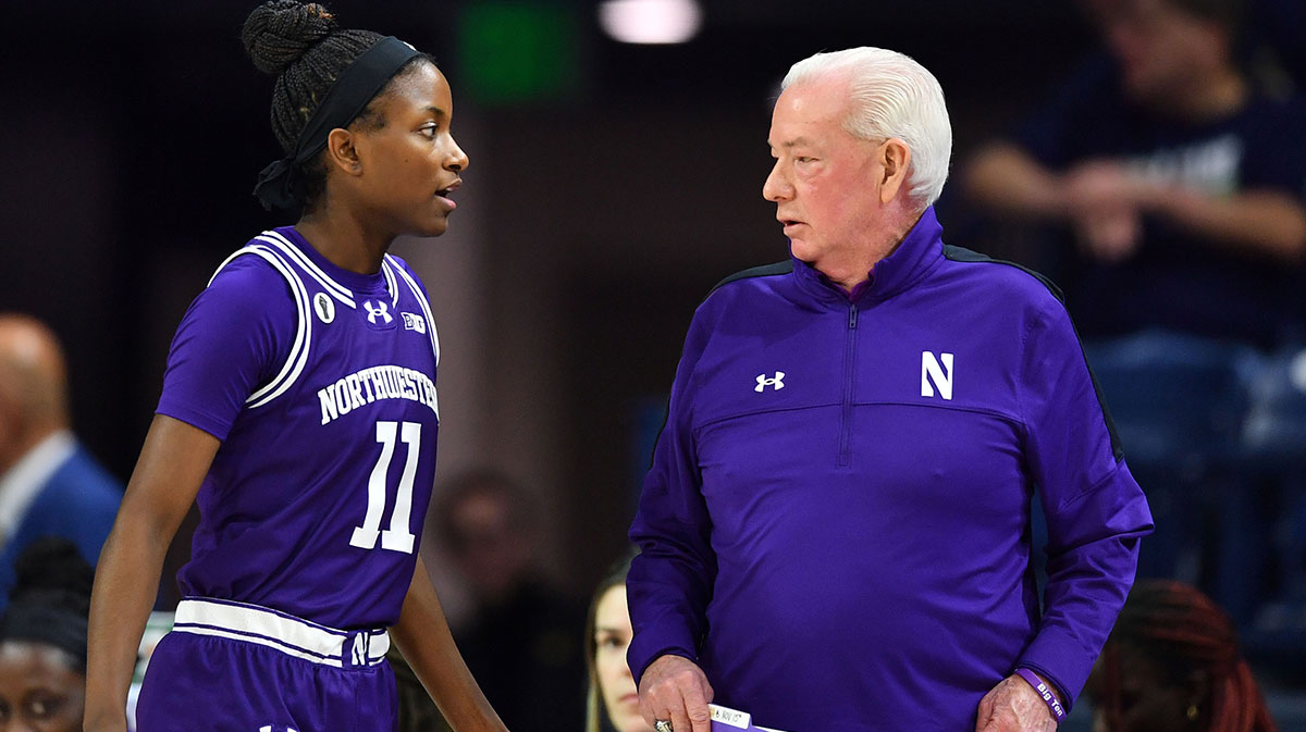 Northwestern Wildcats head coach Joe McKeown talks to guard Hailey Weaver (11) in the first half against the Notre Dame Fighting Irish at the Purcell Pavilion.