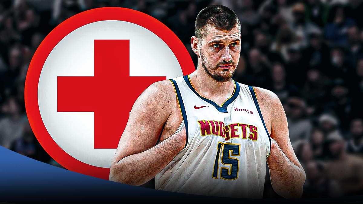 Nuggets' Nikola Jokic with medical red cross symbol