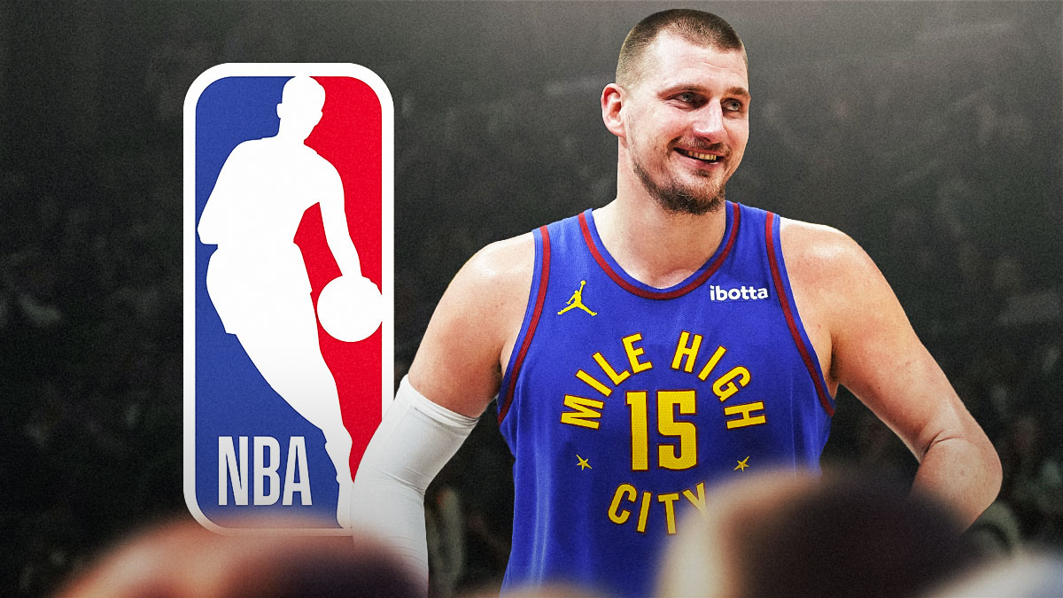 Nikola Jokic yelling or happy next to the NBA logo.