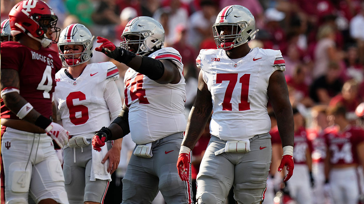 Ohio State Buckeyes offensive lineman Josh Simmons (71) lines up beside offensive lineman Donovan Jackson (74) during the NCAA football game at Indiana University Memorial Stadium. Ohio State won 23-3.
